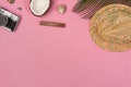 Creative Flat lay fashion style with camera, coconut and panama hat on pink pastel color Royalty Free Stock Photo