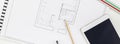 Creative flat lay long wide banner top view blueprints architectural flat project plan office supplies decorator white table