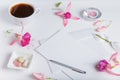 Creative flat lay photo of workspace desk with smartphone, coffee, pencil, flowers with copy space background. Flat lay Royalty Free Stock Photo