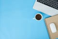 Creative flat lay photo of workspace desk. Top view office desk with laptop, notebooks and coffee cup. Royalty Free Stock Photo