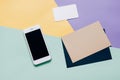 Creative flat lay style workspace desk with smartphone Royalty Free Stock Photo