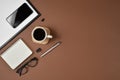 Creative flat lay, top view office table desk. Workspace with blank clip board, office supplies, pen, notepad, smartphone, glasses Royalty Free Stock Photo