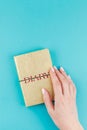 Woman hands holding golden diary Royalty Free Stock Photo