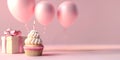 Cupcake muffin with cream icing frosting topping with candle burning on balloon gift pastel pink background