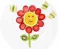 Creative fruit child dessert red flower and butterflies form