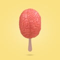Creative funny  idea made from a stick of ice cream and the human brain on a yellow background Royalty Free Stock Photo