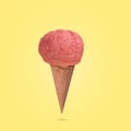 Creative funny  idea made from a waffle cone of ice cream and the human brain on a yellow background Royalty Free Stock Photo