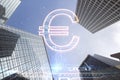 Creative glowing euro sign hologram on blurry city buildings background. Online banking, technology and currency concept. Double Royalty Free Stock Photo