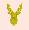 Creative golden fab Christmas reindeer made of glitter on pastel pink background. Winter concept New Year