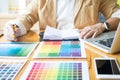 Creative Graphic designer at work. Color swatch samples pantone Royalty Free Stock Photo