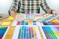 Creative Graphic designer at work. Color swatch samples pantone Royalty Free Stock Photo