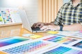 Creative Graphic designer at work. Color swatch samples pantone Royalty Free Stock Photo