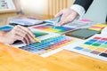 Creative Graphic designer at work. Color swatch samples pantone Royalty Free Stock Photo