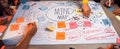 Creative Group Brainstorming Session with Mind Map on Table Using Sticky Notes and Markers for Marketing Strategies and Royalty Free Stock Photo