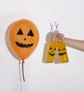 Creative Halloween balloon planning to drink party cocktails