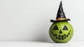 Creative Halloween pumpkin with witch hat white isolate background Royalty Free Stock Photo