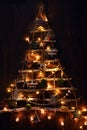 Creative handmade christmas tree illuminated in the dark Royalty Free Stock Photo