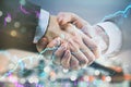 creative handshake and forex chart on blurry bokeh night city background. Financial growth and partnership concept. Double Royalty Free Stock Photo