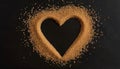 Creative heart shape frame made of brown sugar on black background, cane sugar heart Royalty Free Stock Photo