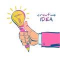 Creative idea concept. Hand holding pencil with bright glowing light bulb. Royalty Free Stock Photo