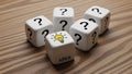 Creative Idea Concept Represented by Dice with Question Marks and Lightbulb Symbol Royalty Free Stock Photo