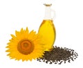 Creative idea flower of a sunflower, seeds and oil glass bottle Royalty Free Stock Photo