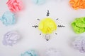 Creative idea, inspiration, new idea and innovative concept with a Crumpled Paper light bulb