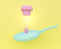 Creative idea layout made of light bulbs glowing with chef hat floating and pan on yellow color background. minimal business conce