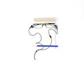 Creative idea Men face with Eyeglasses and blue pencil and Notepad with ear phone