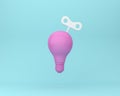 Creative idea wind up key with Light bulb on pastel blue background. minimal business ideas concept