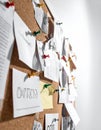 Creative Ideas and Notes Pinned to an Office Corkboard Royalty Free Stock Photo