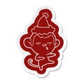 cartoon sticker of a suspicious monkey wearing santa hat
