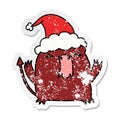 christmas distressed sticker cartoon of kawaii devil Royalty Free Stock Photo