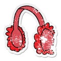 distressed sticker cartoon doodle of pink ear muff warmers