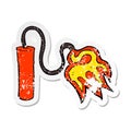 Retro distressed sticker of a cartoon dynamite burning