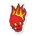 sticker of a cartoon flaming skull