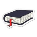 sticker of a cartoon thick book