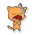 sticker of a cartoon yawning cat