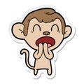 sticker of a yawning cartoon monkey