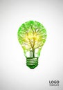 A creative illustration portrays a green tree growing inside a light Royalty Free Stock Photo