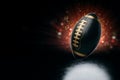 Creative image of a black and gold American football ball on a dark background photorealism. American sports, big final, strength Royalty Free Stock Photo