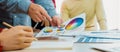 Designer team discuss about color selection from color wheel. Variegated. Royalty Free Stock Photo