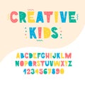 Creative kids font. Childish alphabet with decorative elements. Royalty Free Stock Photo