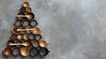 Creative kitchen arrangement: cups and spices forming a christmas tree on concrete background Royalty Free Stock Photo