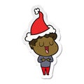 A creative laughing sticker cartoon of a man wearing santa hat