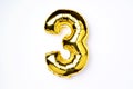 Creative layout. Golden foil balloon number and digit three 3. Birthday greeting card. Anniversary concept. Top view