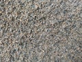 Creative layout of grains of sand in gray