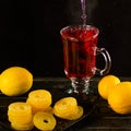 Creative layout made of cup of hibiscus tea and lemon on a white background. Top view. Royalty Free Stock Photo