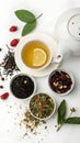 Creative layout made of cup of tea green tea black tea fruit and herbal tea on white background Flat Royalty Free Stock Photo