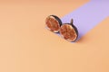 Creative layout made with figs and paper artificial shadow on orange background